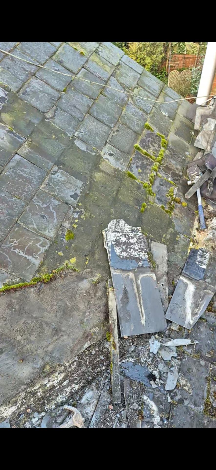 Storm-Damaged Slate Roof